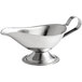 A Vollrath stainless steel gravy boat with a handle.