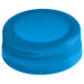 A blue plastic cap for juice bottles with a white background.