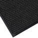 A black Lavex Needle Rib indoor entrance mat with a black border.