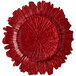 A red glass charger plate with a sponge textured pattern.