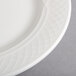 A close-up of a Homer Laughlin Kensington Ameriwhite bright white china plate.