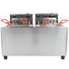 A Cecilware stainless steel electric countertop deep fryer with red handles.
