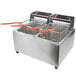 A Cecilware stainless steel electric countertop double fryer with red handles.