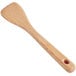 An OXO wooden saute paddle with a hole in the handle.
