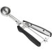 An OXO stainless steel and black plastic ice cream scoop with a squeeze handle.
