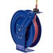 A blue metal Coxreels hose reel with a low pressure hose attached.