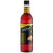 A bottle of DaVinci Gourmet Classic Sour Gummy Candy flavoring syrup with a red label on it.