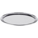 A stainless steel oval tray with a fluted rim.