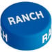 A blue cap with a round white button with "Ranch" in white text.