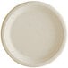 A white Tellus Products natural bagasse plate with a plain edge on a white background.