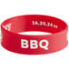 A red silicone wristband with white text reading "BBQ"