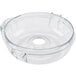 A clear plastic container with a hole sitting inside a clear stainless steel bowl.
