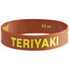 A white silicone rubber band with the word "Teriyaki" in yellow.