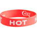 A red silicone wristband with white text that says "Hot"