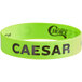 A green silicone wristband with the word "Caesar" in black text.