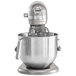 A silver KitchenAid bowl lift countertop mixer with standard accessories.