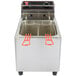 A Cecilware stainless steel electric countertop deep fryer with two baskets.
