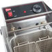 A Cecilware stainless steel electric commercial countertop deep fryer with a basket and a lid.