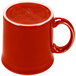 A Fiesta Scarlet china java mug with a red exterior and white interior and handle.