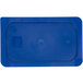 A blue plastic lid for a Carlisle food pan with a hole in it.
