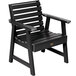 A black outdoor arm chair with wooden slats.