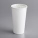A white Choice paper cold cup with a translucent lid on a white surface.