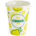 A white and yellow Carnival King paper cup with a lid and lemons on it.