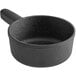 A black round cast iron pan with a handle.
