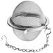 A close-up of a stainless steel Choice tea ball infuser with chain.