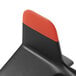 An OXO black and orange plastic ground meat chopper with a red stripe on the scraping edge.