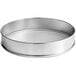 A round silver stainless steel sieve with a white background.