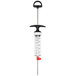 An OXO marinade injector with a black and red handle.