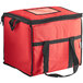 A red insulated cooler bag with black straps and a black zipper.