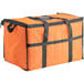 An orange insulated cooler bag with black straps.