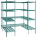 A close-up of a green metal structure with shelves.