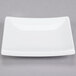 A CAC Tokyia bone white square porcelain plate on a white background.