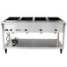 A Vollrath ServeWell SL electric hot food table with four pans in a sealed well.