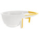 A white and yellow OXO plastic bowl with a yellow handle and strainer.