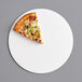 A slice of pizza on a 12" white corrugated pizza circle.