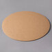 A 14" white corrugated cardboard circle on a gray surface.