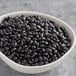 A bowl of Goya black beans.