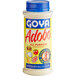 A white bottle of Goya Adobo All-Purpose Seasoning with a yellow label and blue lid.