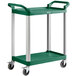 A green utility cart with silver legs and two shelves.