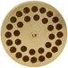 A circular brass die with holes in it.