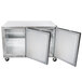 A Traulsen stainless steel undercounter refrigerator with two right hinged doors.