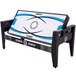 A Triumph 4-in-1 game table with air hockey set up on it.