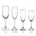 Acopa flute wine glasses with stems on a white background.
