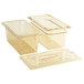 A Cambro amber plastic food pan with a clear lid and colander pan.