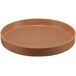 A brown round Cal-Mil Hudson melamine plate with a raised rim.