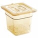 A Cambro amber plastic 1/6 size food pan with colander pan and lid.